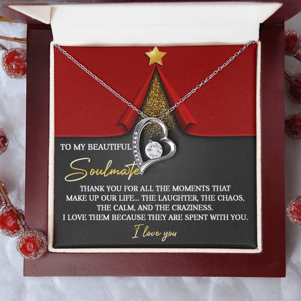 The Soulmate-The Moments - Forever Love Necklace, featuring a heart-shaped pendant embellished with cubic zirconia and finished in white gold, is presented in a box that includes a heartfelt message conveying love and gratitude to your soulmate.