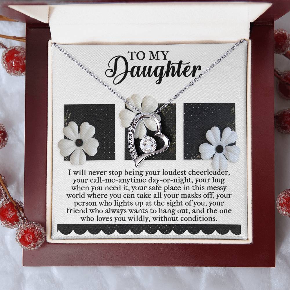 The Daughter-Loudest Cheerleader - Forever Love Necklace showcases interlocking hearts with a stunning CZ crystal, beautifully packaged in a decorative box. Its white gold finish adds an extra touch of elegance, complemented by a heartfelt note addressed specifically to a daughter.