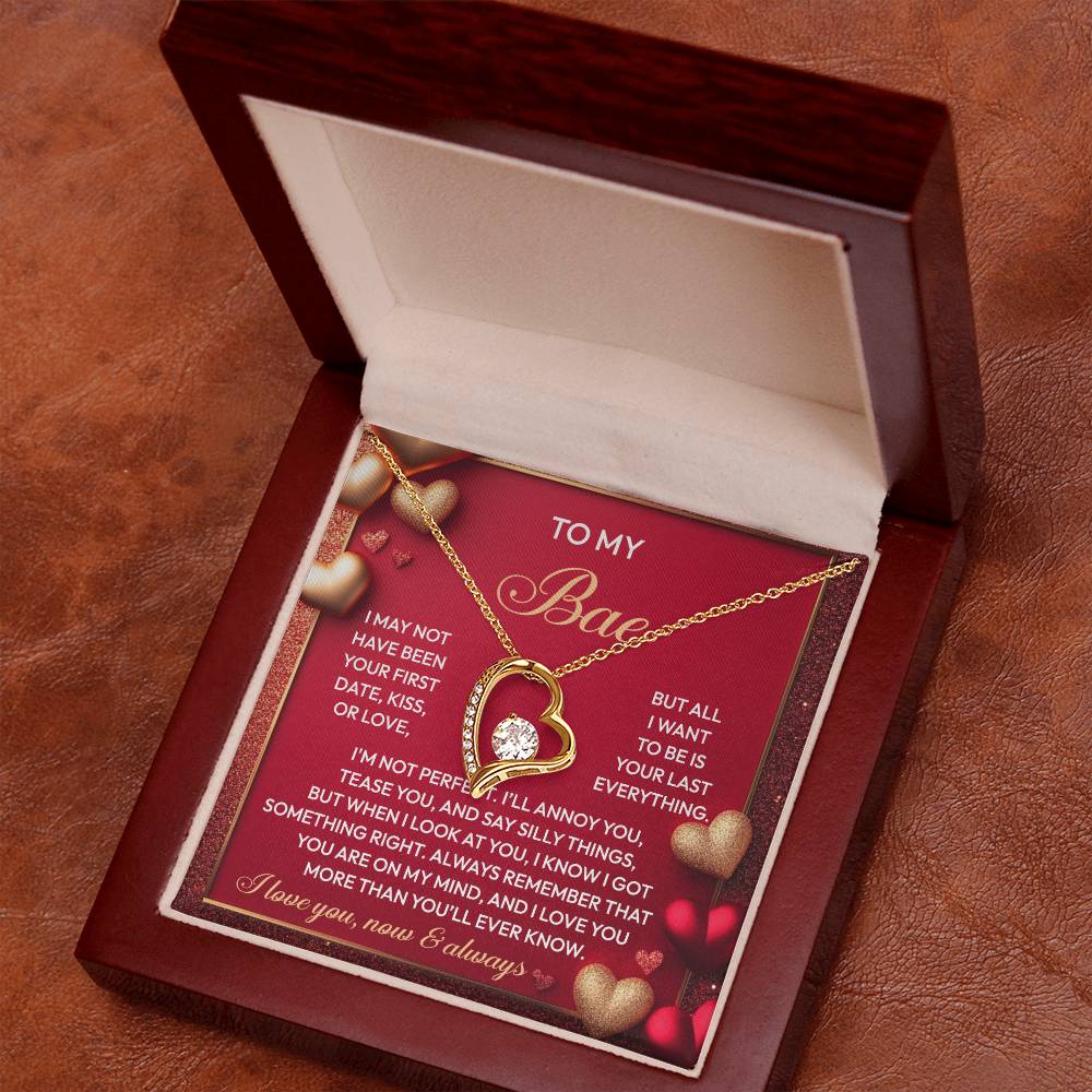 The Soulmate-On My Mind - Forever Love Necklace, showcasing a gold heart-shaped pendant with a CZ crystal, is elegantly placed in an open wooden box. A romantic message serves as the backdrop, making it the perfect gift to cherish forever.