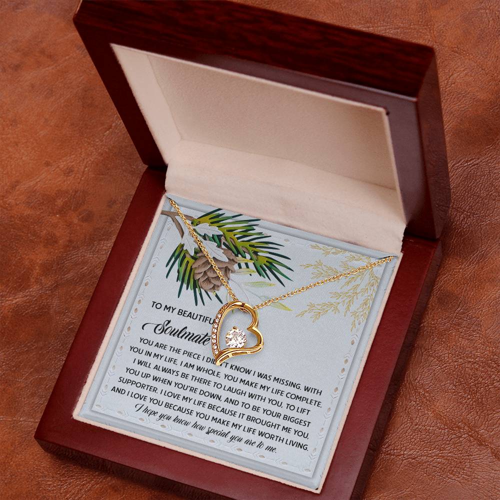 The Soulmate-Biggest Supporter - Forever Love Necklace, featuring a CZ crystal pendant on a gold finish chain, is beautifully presented in a wooden box accompanied by a heartfelt printed message.