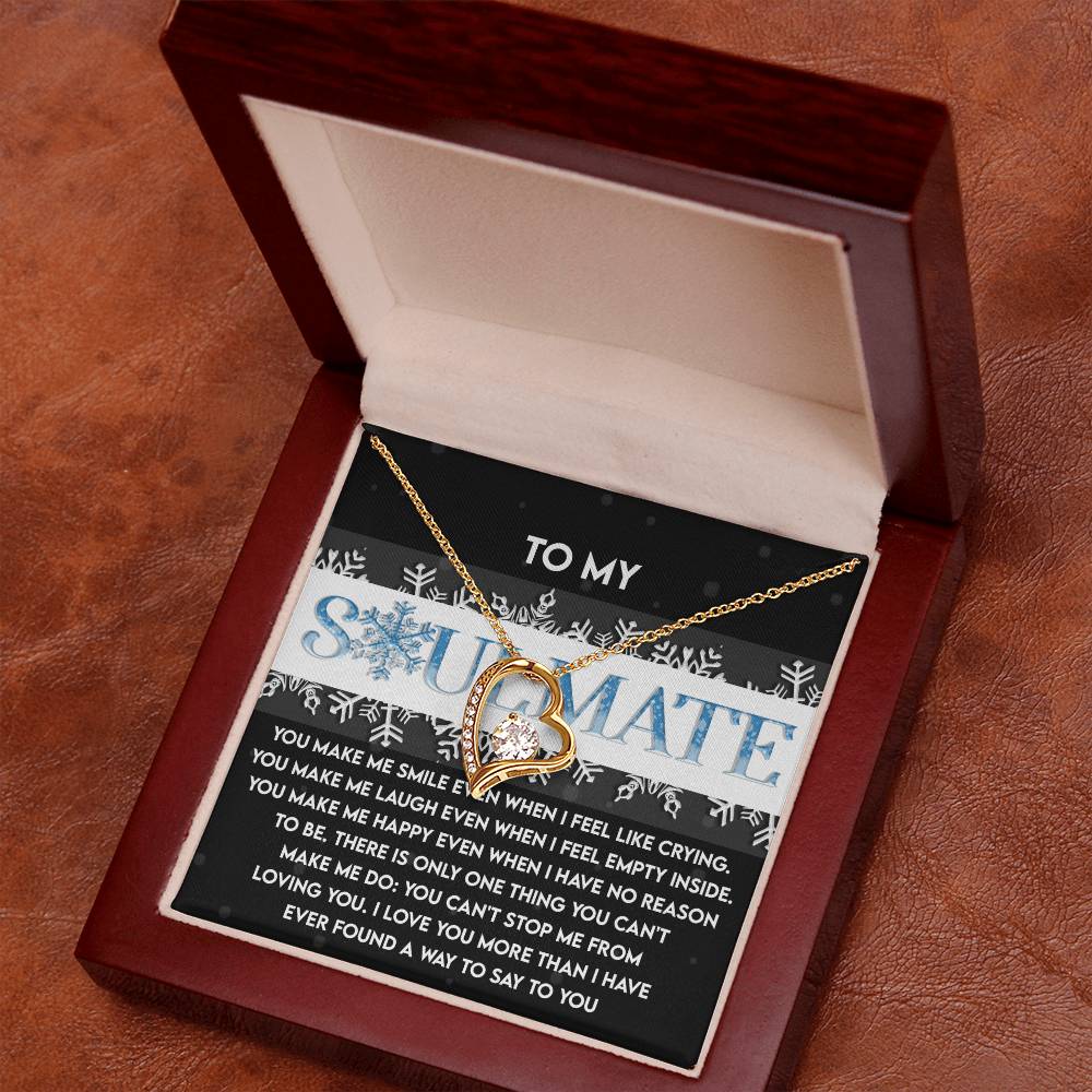 The Soulmate-Loving You - Forever Love Necklace, adorned with a heart-shaped pendant featuring a cubic zirconia stone, is gracefully presented in an open wooden box on a card that reads, "TO MY SOULMATE.