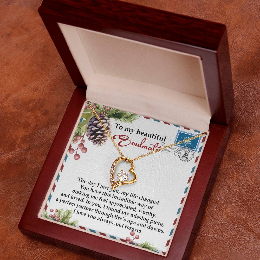 The Soulmate-Perfect Partner - Forever Love Necklace showcases a heart-shaped pendant embellished with cubic zirconia and a stunning gold finish. It is beautifully presented in a wooden box that includes an insert with a heartfelt message for your soulmate.