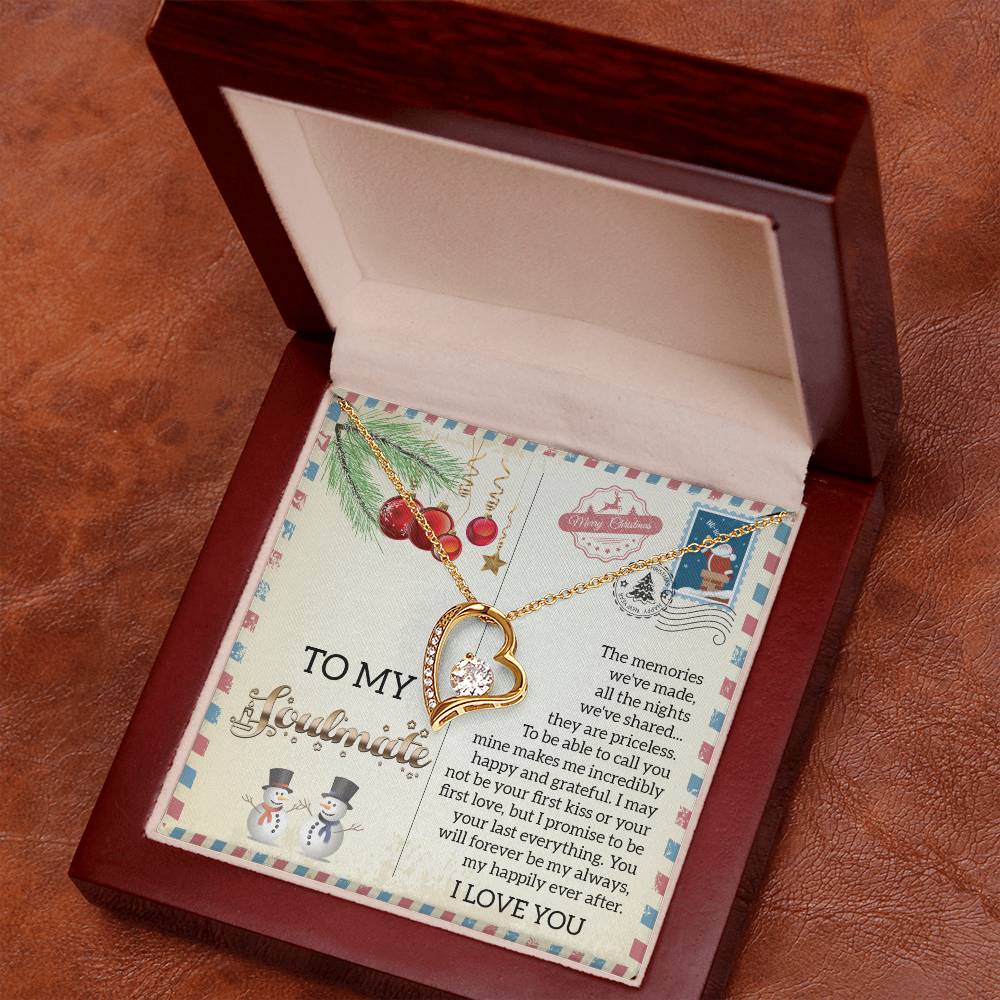 Open wooden box showcasing the Soulmate-Last Everything - Forever Love Necklace with a stunning white gold finish. The heart-shaped pendant, adorned with CZ crystal, rests gracefully next to a card featuring festive graphics and a sentimental message.