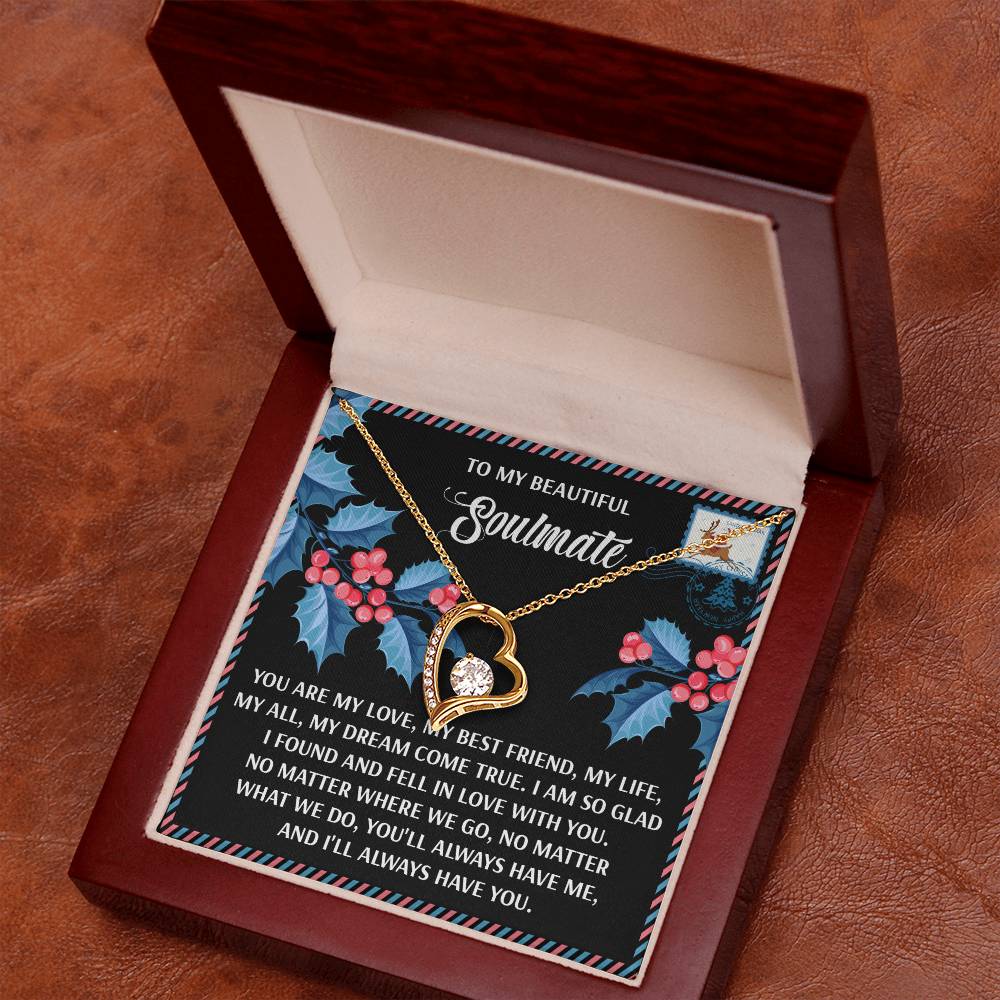 Discover the Soulmate-Fell In Love - Forever Love Necklace: a gold heart-shaped treasure in a wooden box, adorned with intricate floral and heart designs and inscribed with sentiments of love. It's the perfect personalized gift for your beloved soulmate.