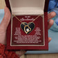 A hand unveils the Soulmate-One True Love - Forever Love Necklace, featuring a heart-shaped pendant with cubic zirconia and a touching message on enduring love. Offered in white or yellow gold finishes.