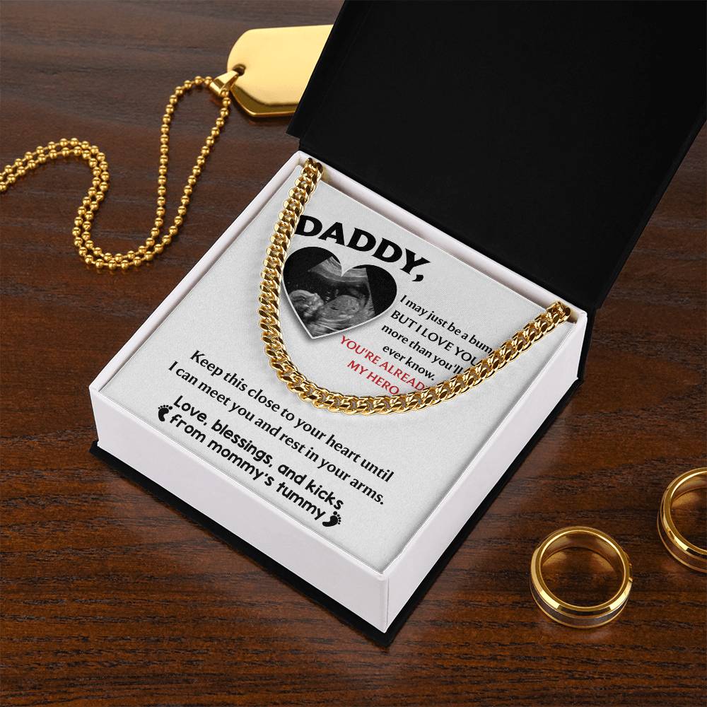 Pendant with a heart-shaped cutout containing an ultrasound image, surrounded by a To Dad, To Your Heart - Cuban Link Chain necklace and a message from an unborn child to their father.