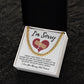 A "Sorry-The Pieces - Cuban Link Chain," crafted in 14K yellow gold, presented in a box with a heartfelt note that reads "I'm Sorry." The note features an illustration of a heart with a bandage and conveys regret for shattering your heart, asking for an opportunity to make amends.