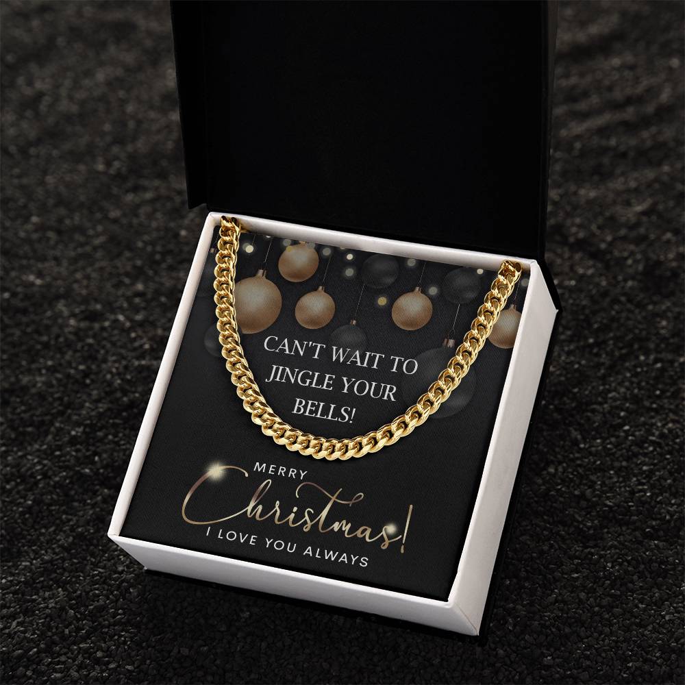 In an open black gift box lies "My Man-Jingle Your Bells - Cuban Link Chain," a 14K yellow gold piece, accompanied by a festive card that reads, "Can't wait to jingle your bells! Merry Christmas! I love you always.