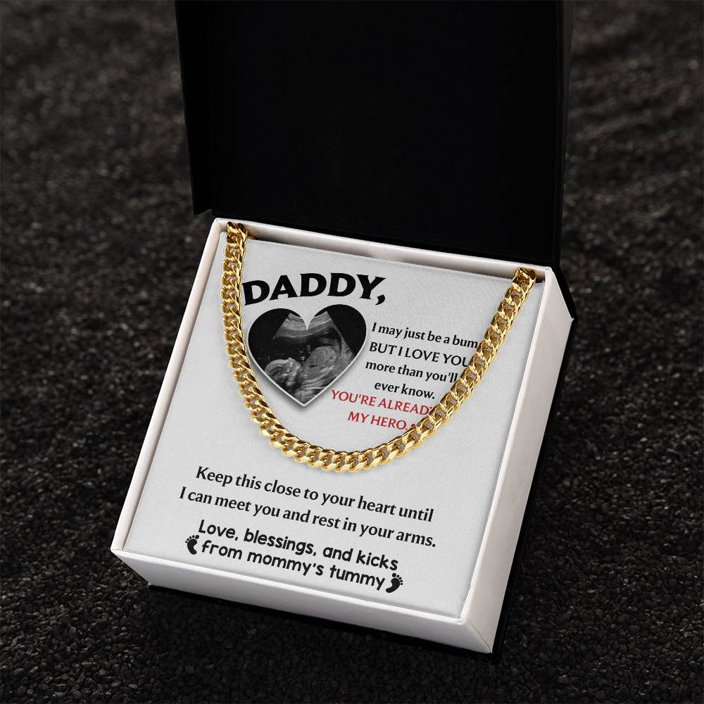 Pendant with a heart-shaped cutout containing an ultrasound image, surrounded by a To Dad, To Your Heart - Cuban Link Chain necklace and a message from an unborn child to their father.