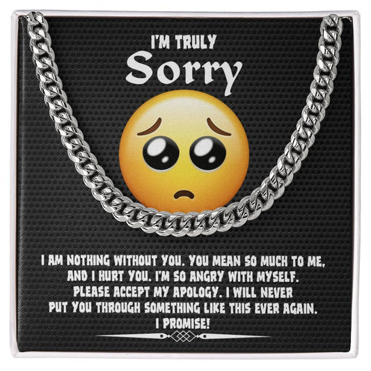 A Sorry-Accept My Apology Cuban Link Chain draped over a note featuring a sad emoji and an apology message, expressing regret and a promise never to repeat the mistake.