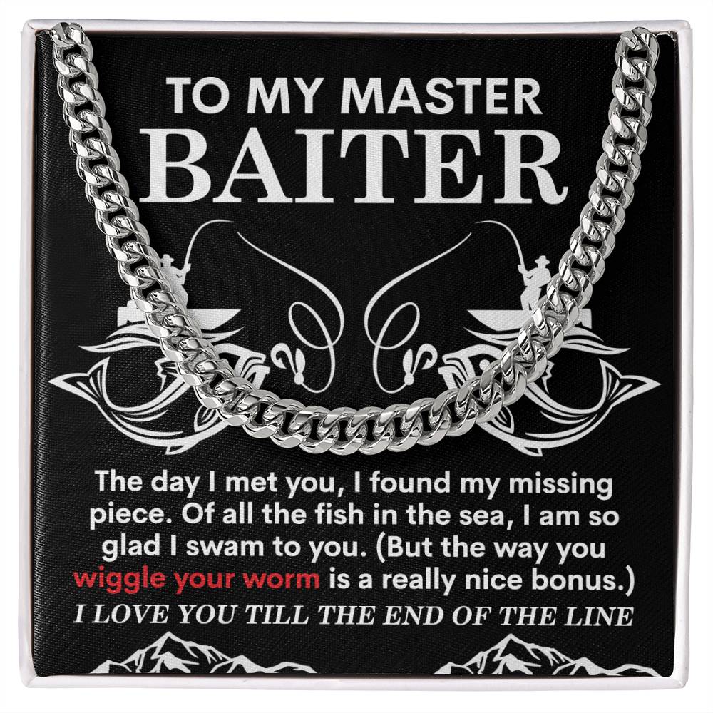 The My Man-In The Sea - Cuban Link Chain, available in polished stainless steel or 14K yellow gold, showcases a black square with humorous fishing-themed text about being a "master baiter," complete with boating graphics and playful wording.