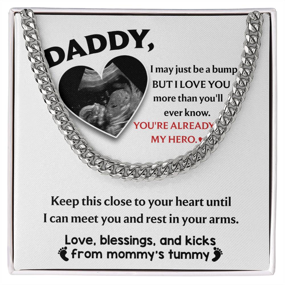 Pendant with a heart-shaped cutout containing an ultrasound image, surrounded by a To Dad, To Your Heart - Cuban Link Chain necklace and a message from an unborn child to their father.