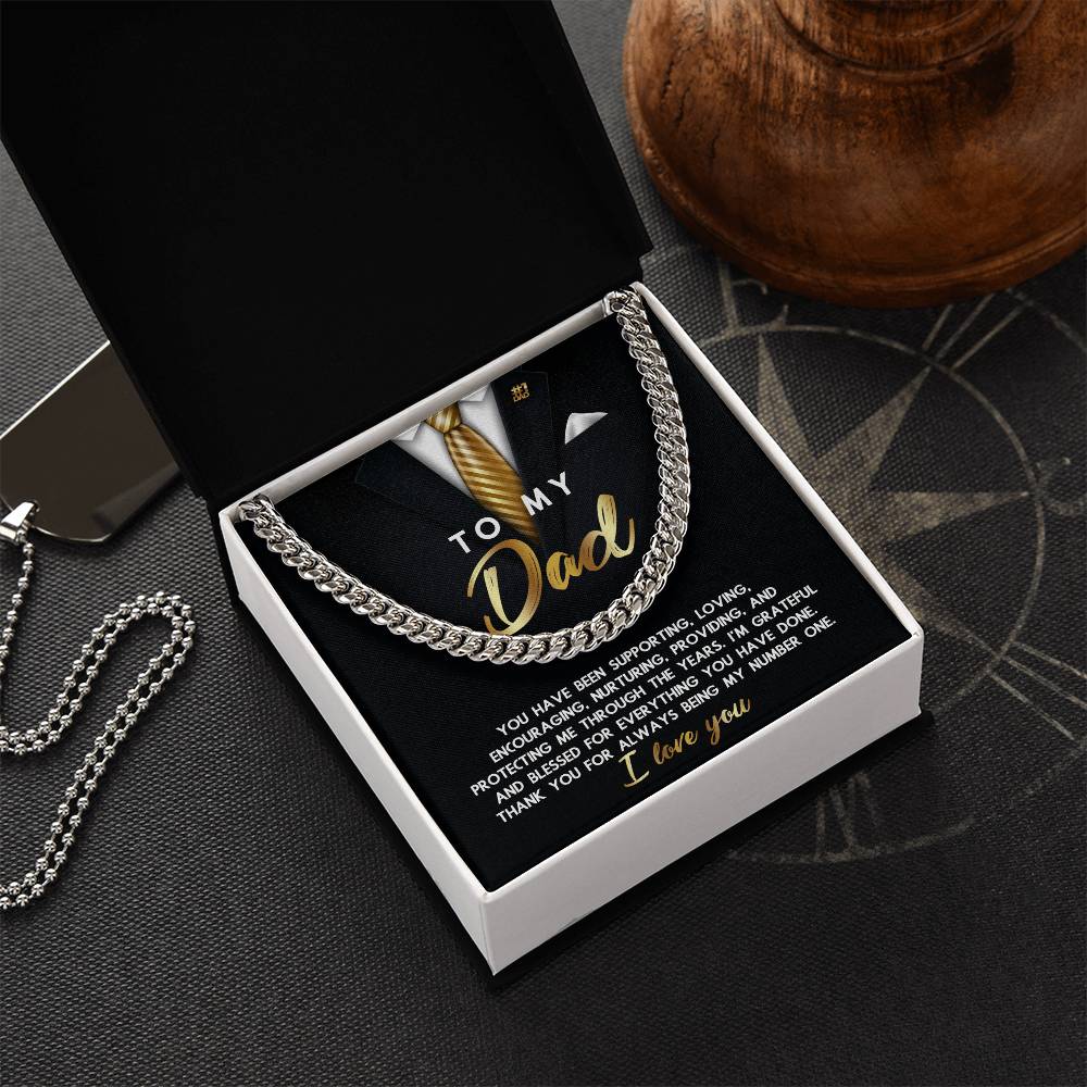 Gift bag with a design resembling a suit and tie, featuring a heartfelt message to a father, adorned by the To Dad, Through The Years - Cuban Link Chain.
