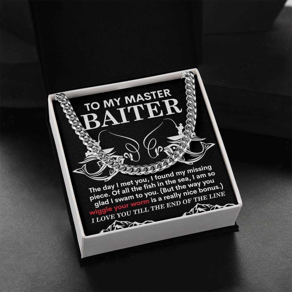 The My Man-In The Sea - Cuban Link Chain, a polished stainless steel necklace, rests in an open black box. It features a humorous message for "My Master Baiter," symbolizing finding that missing piece and expressing love, with its shine adding a personal touch to the joke.