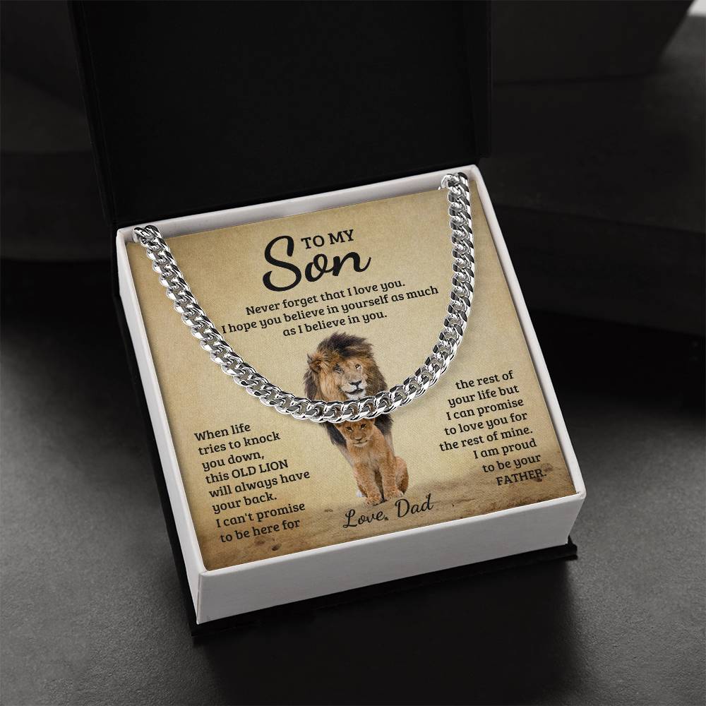 A ShineOn Fulfillment silver necklace with a To My Son, Never Forget That I Love You - Cuban Link Chain in a gift box with an inspirational message from a father to a son featuring a lion image.