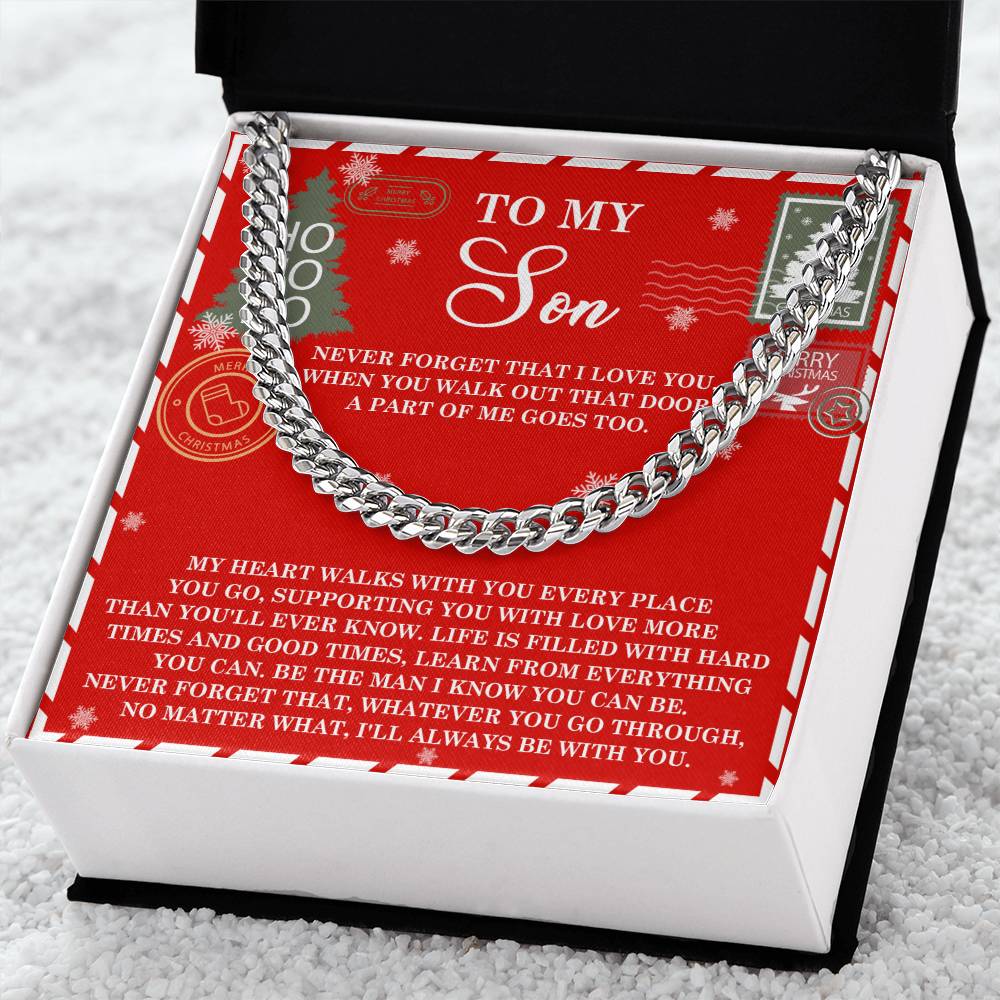 A Cuban Link Chain, known as "Son-That Door," rests on a red card in a black box. The card features a heartfelt message, making it the perfect gift for your son.