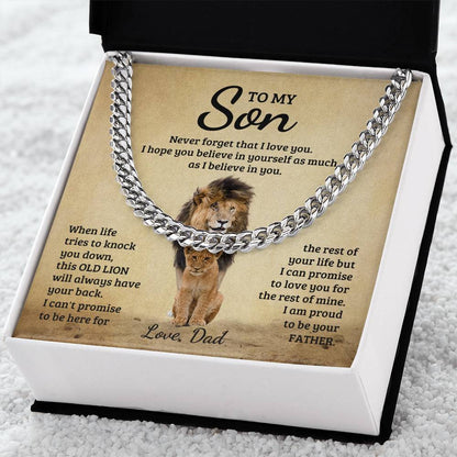 A ShineOn Fulfillment polished stainless steel To My Son, Never Forget That I Love You - Cuban Link Chain necklace displayed in an open gift box with an inspirational message from a father to a son, featuring an image of a lion and its cub.