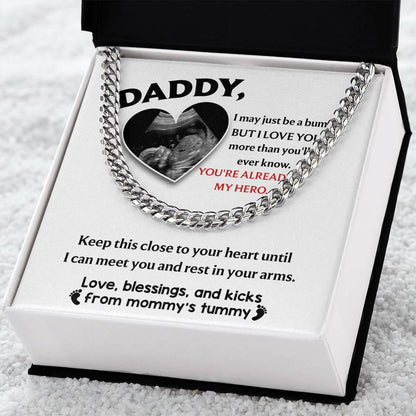 Pendant with a heart-shaped cutout containing an ultrasound image, surrounded by a To Dad, To Your Heart - Cuban Link Chain necklace and a message from an unborn child to their father.