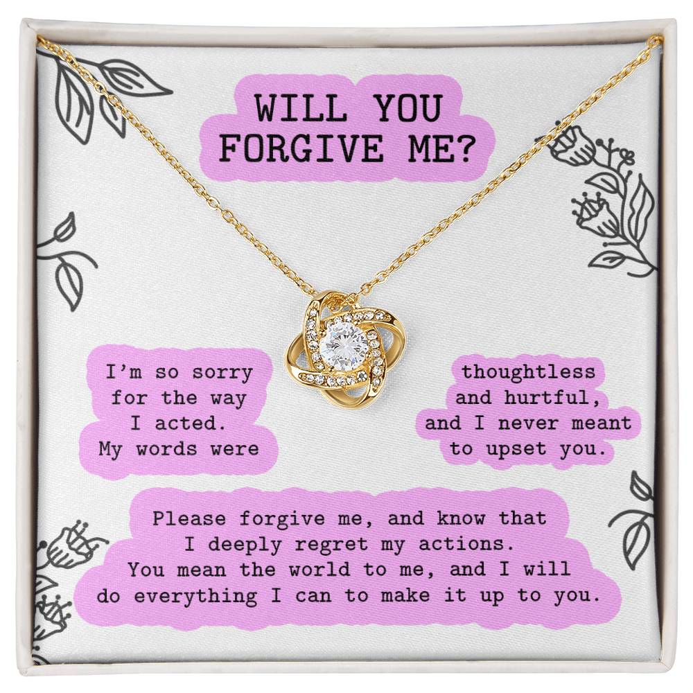 The Sorry-Never Meant To - Love Knot Necklace, adorned with a heart-shaped pendant and cubic zirconia crystals, is displayed against a background with purple text that reads, "WILL YOU FORGIVE ME?" followed by an apology message detailing regret and a promise to make amends.