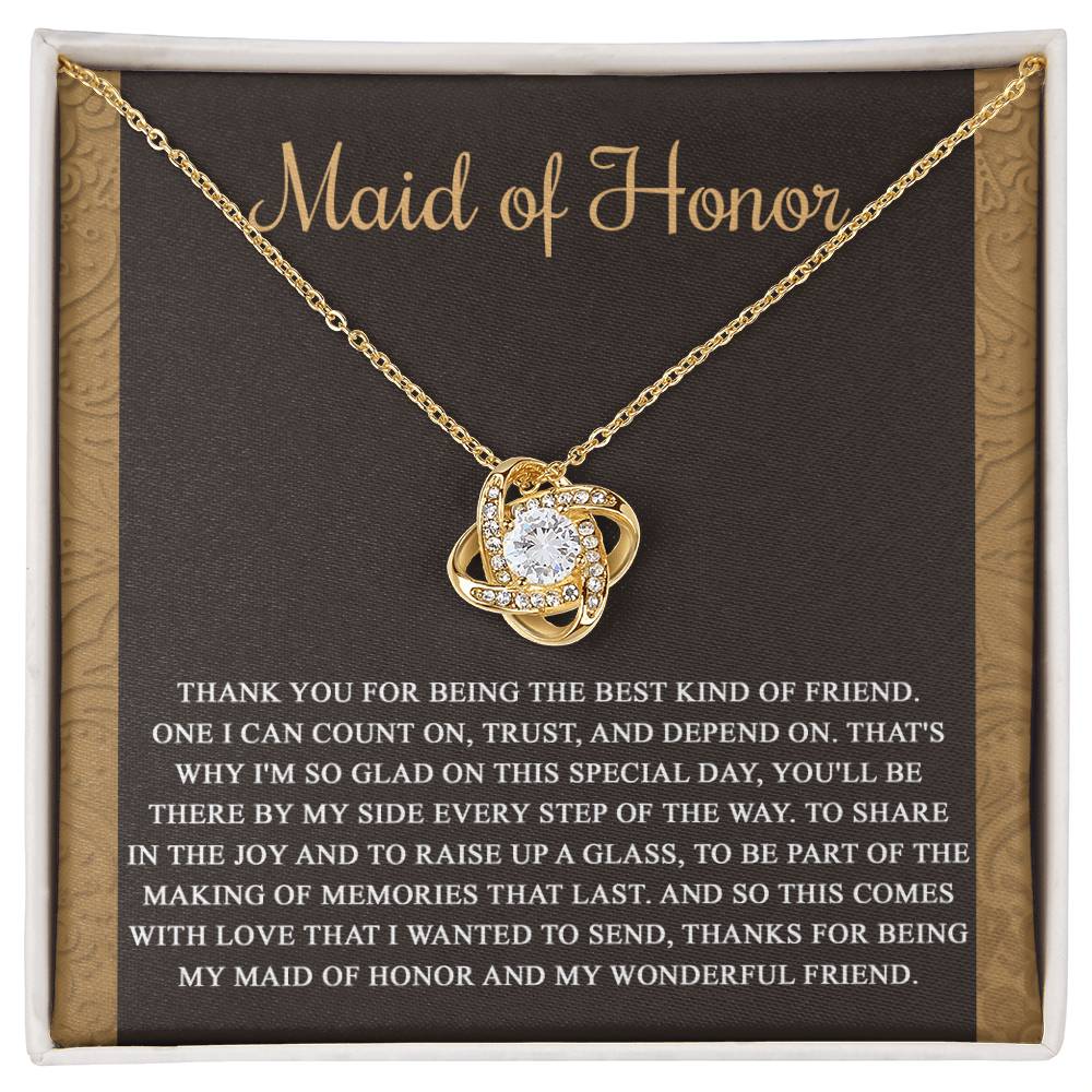 The "To Maid of Honor, Kind Of Friend - Love Knot Necklace" features an intertwined knot design adorned with cubic zirconia crystals on a background that reads "Maid of Honor," followed by a heartfelt thank you message to the maid of honor.