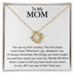 A gold heart-shaped To My Mom, You Are My First Country - Love Knot Necklace expressing love and appreciation, showcased in a square frame by ShineOn Fulfillment.