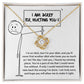 The Sorry-Missing Piece - Love Knot Necklace, adorned with cubic zirconia crystals, is displayed in a box with a heartfelt message of apology and love.
