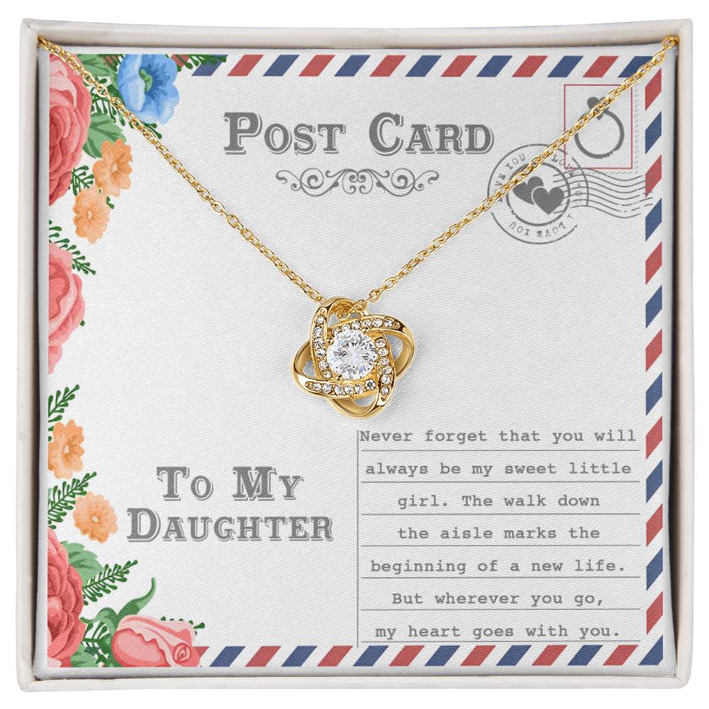 The "To Daughter, Goes With You - Love Knot Necklace," featuring an intertwining design with a gold finish and adorned with cubic zirconia crystals, is displayed on a postcard that reads "To My Daughter." The message includes a heartfelt note about your daughter's wedding and a mother's enduring love.