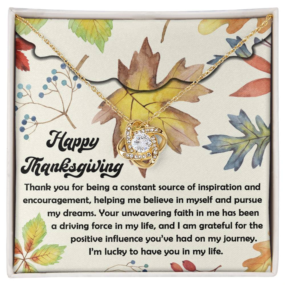 The Thanksgiving-On My Journey - Love Knot Necklace, featuring a heart pendant, is presented on a Thanksgiving-themed card adorned with a gratitude message. Encircled by autumn leaves and berries, this personalized gift shimmers with cubic zirconia, embodying the heartfelt sentiments of the season.