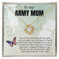 A Love Knot Necklace in the ShineOn Fulfillment brand, with a heart-shaped pendant adorned with cubic zirconia crystals and an American flag motif, presented in a box with a sentimental message addressed to an "army mom.