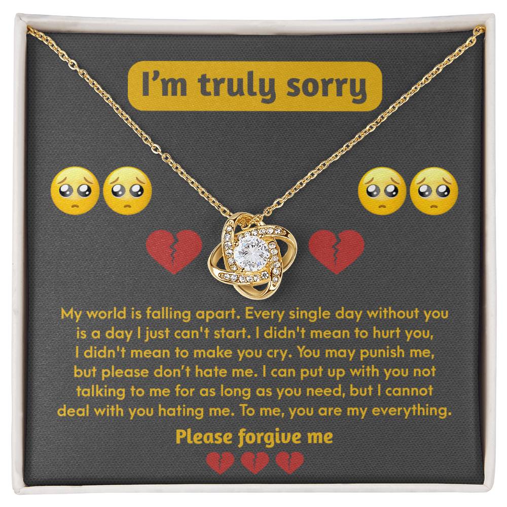 The Sorry-Make You Cry - Love Knot Necklace, featuring a cubic zirconia pendant and presented in a gift box, comes with an apology message adorned with heart and crying face emojis. The heartfelt note expresses profound regret and earnestly seeks forgiveness.