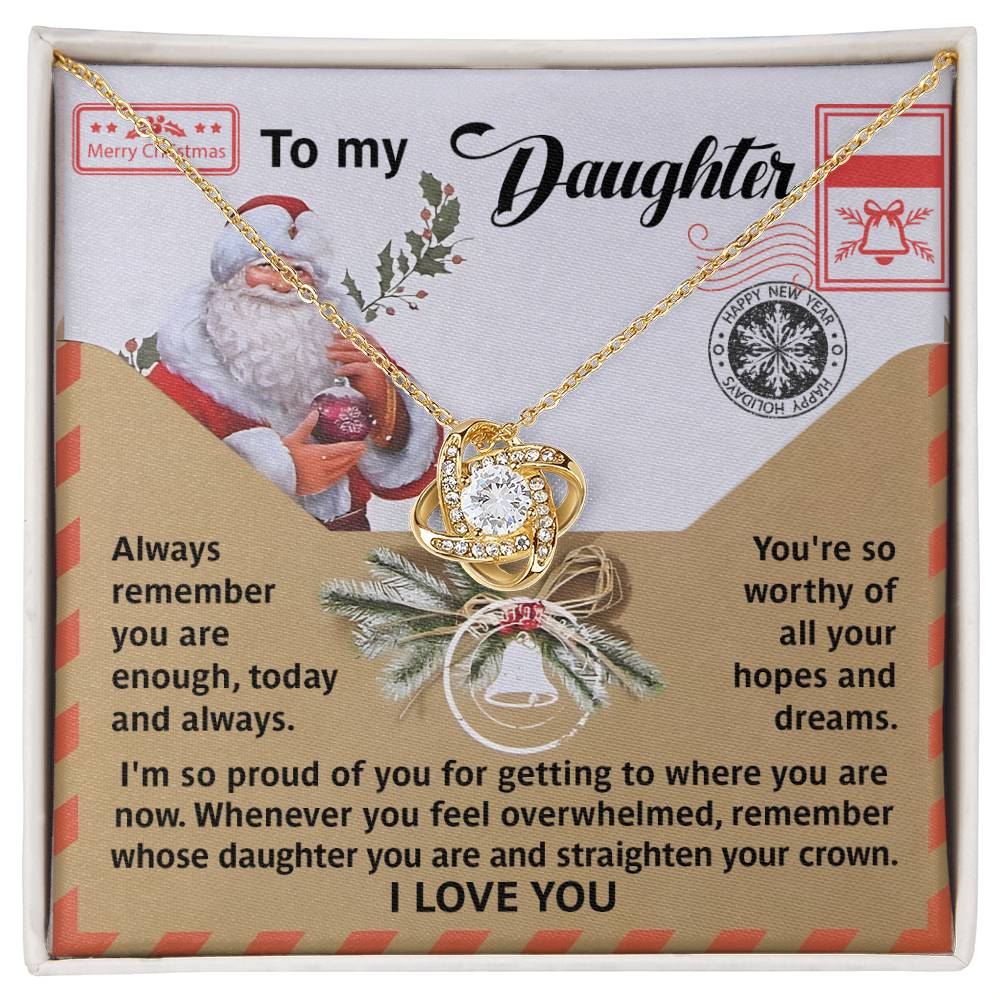 This elegant Daughter-All Your Hopes - Love Knot Necklace gift box for daughters showcases a beautiful pendant adorned with sparkling cubic zirconia crystals and a luxurious gold finish. The festive Christmas design includes a cheerful Santa and comes complete with a heartfelt note, making it an ideal holiday surprise.