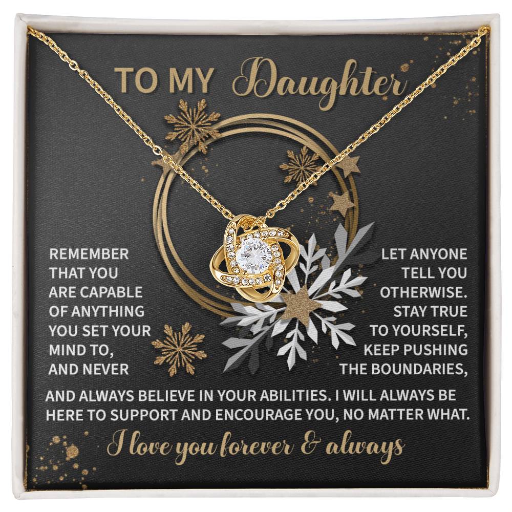 Showcased on a card with an inspirational message for a daughter, the "Daughter-Set Your Mind - Love Knot Necklace" boasts a beautiful cubic zirconia pendant. This exquisite and personalized gift beautifully combines elegance and heartfelt sentiment, making it ideal for any special occasion.