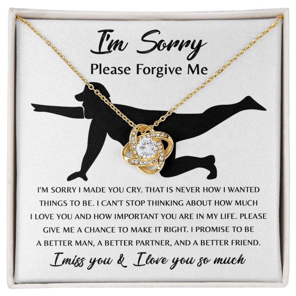 The Sorry-Things to Be Love Knot Necklace features an intertwined knot pendant adorned with cubic zirconia crystals and comes with a heartfelt card that depicts a silhouette of a person kneeling and the words, "I'm sorry, please forgive me... I promise to be a better man..." among other touching text. This classic gift speaks volumes.