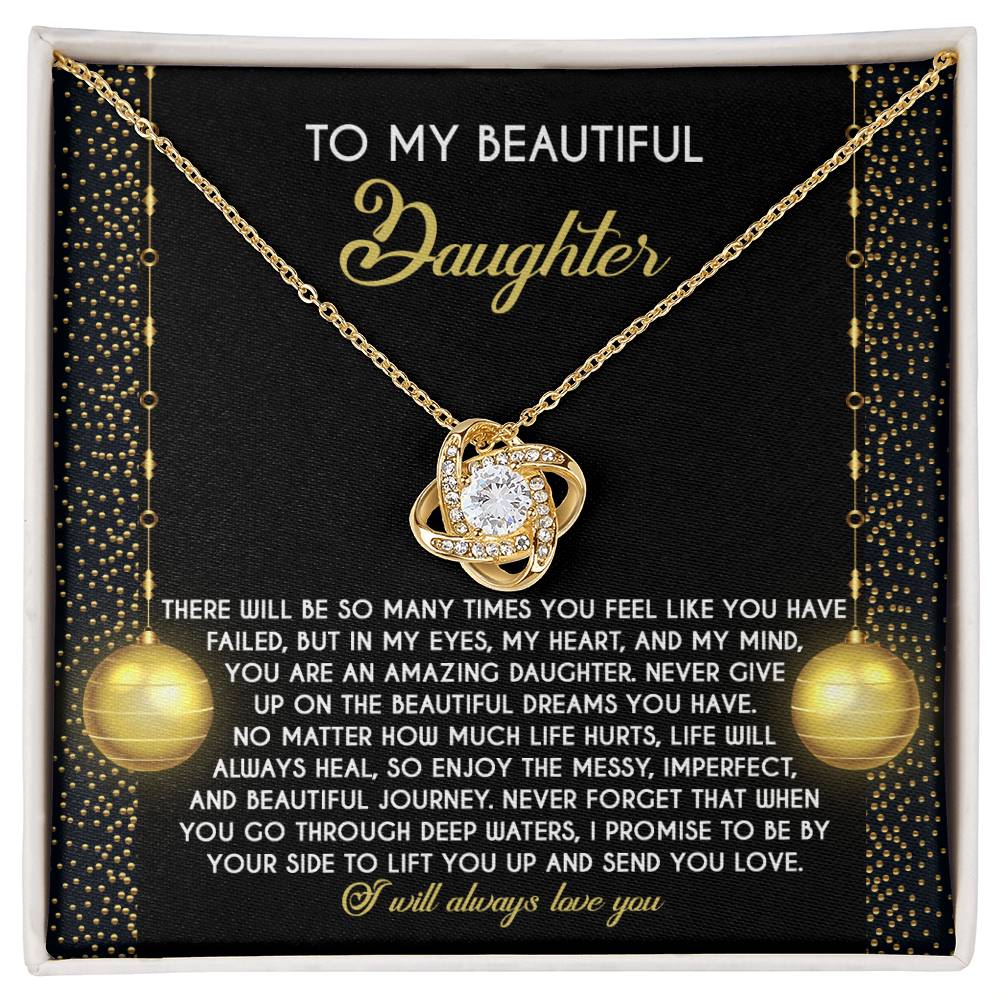 Daughter-Deep Waters - Love Knot Necklace features an intertwined pendant adorned with sparkling cubic zirconia crystals, presented on a card with an inspirational message for a daughter.