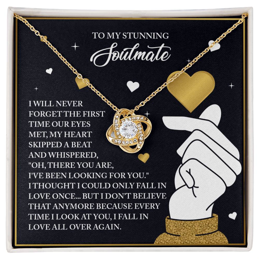 The Soulmate-Look At You - Love Knot Necklace, featuring a white gold finish and cubic zirconia crystals, is beautifully presented in a box with romantic text and hand-heart illustrations, under the title "To My Stunning Soulmate.