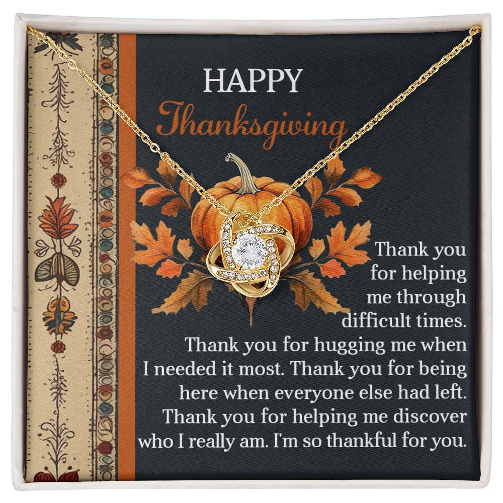 The "Thanksgiving-I Really Am" Love Knot Necklace, featuring cubic zirconia crystals, is presented on a card adorned with a Thanksgiving message. The card highlights autumnal designs and a pumpkin motif, which beautifully accentuates the necklace's sophisticated white gold finish.