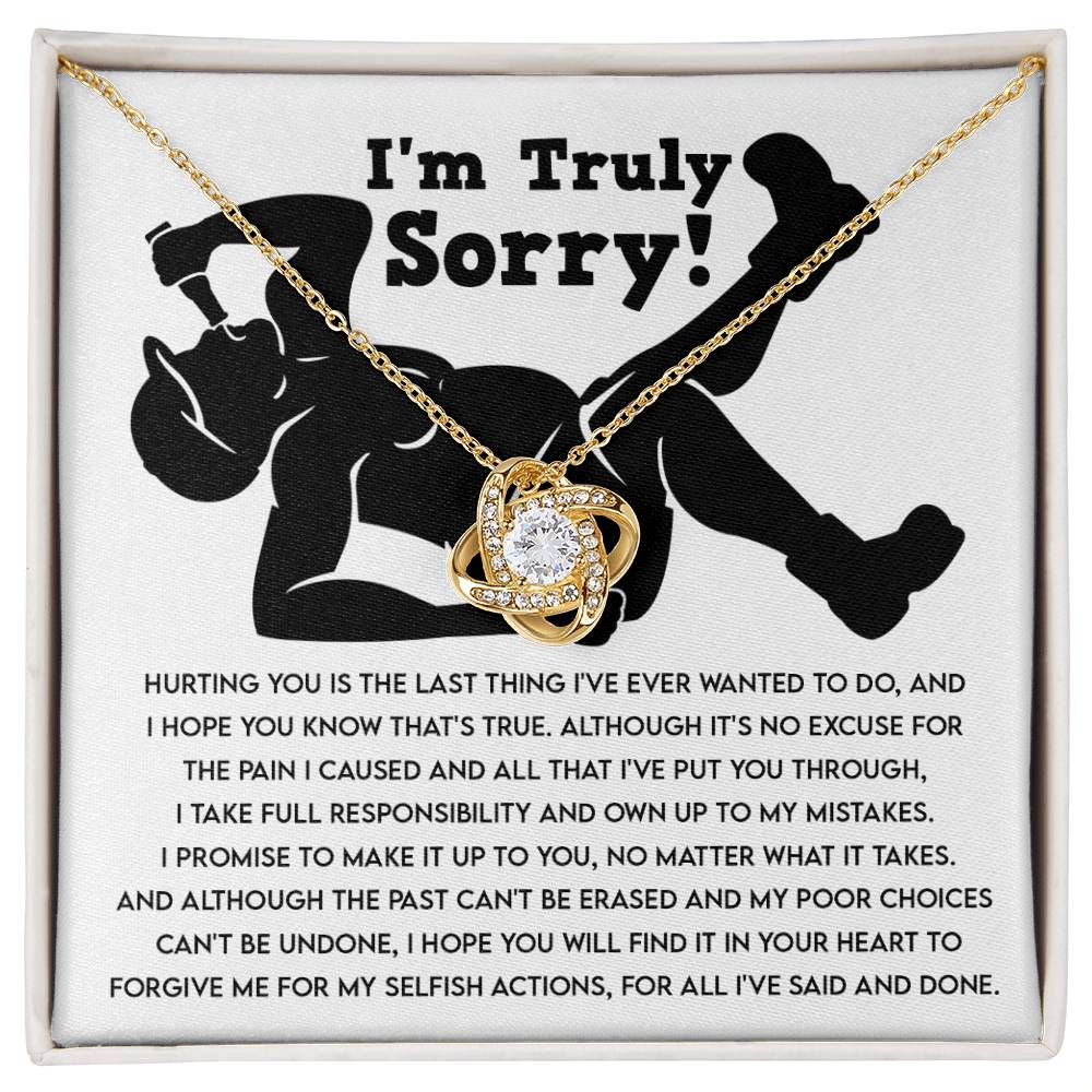 The "Sorry-Selfish Actions - Love Knot Necklace" with shimmering cubic zirconia crystals on a white background features a heartfelt apology that reads: "I'm Truly Sorry! Hurting you is the last thing I've ever wanted to do... I hope you will find it in your heart to forgive me.