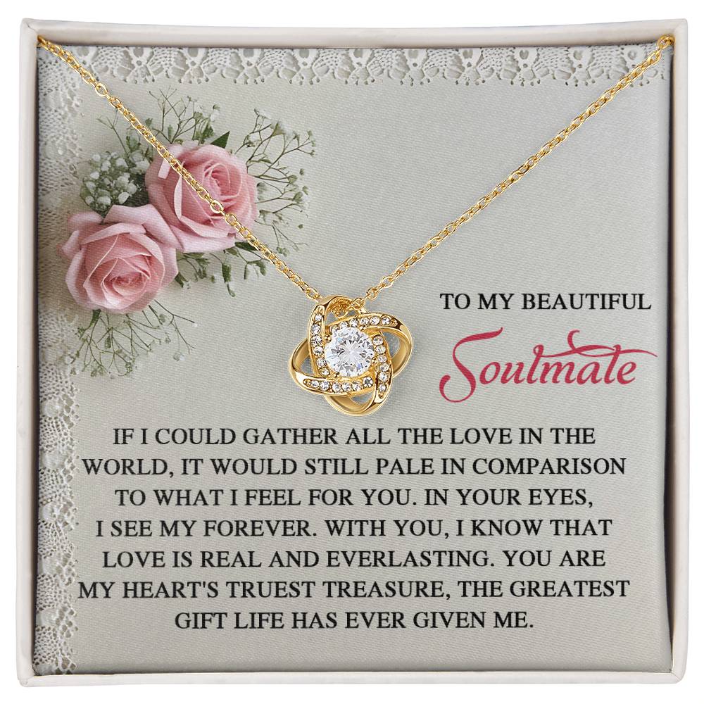 The Soulmate-Given Me Love Knot Necklace, adorned with cubic zirconia, elegantly rests on a decorative card with roses and a heartfelt message for your "Beautiful Soulmate.