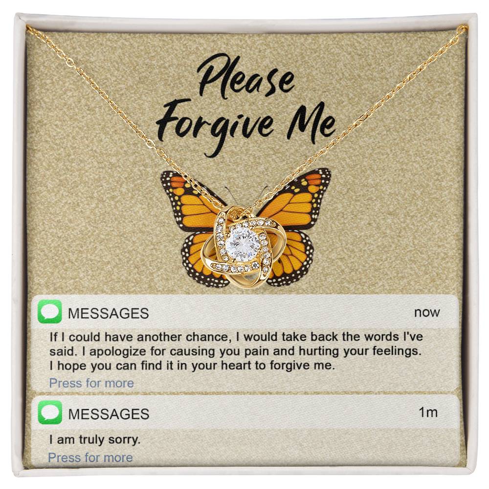 The "Sorry-In Your Heart - Love Knot Necklace" features a butterfly backdrop with cubic zirconia crystals, displayed above a printed message that reads "Please Forgive Me." Below the message, it includes an apology text and a brief follow-up with "I am truly sorry.