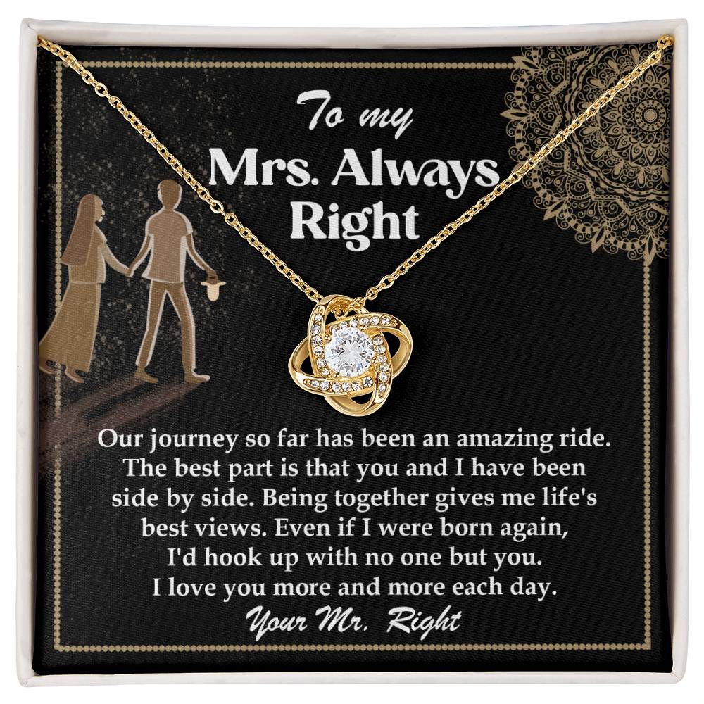 A silver To Wife, Always Right - Love Knot Necklace with an intertwined design, adorned with cubic zirconia crystals, placed on a card that reads: "To my Mrs. Always Right" with a romantic message about love and appreciation.