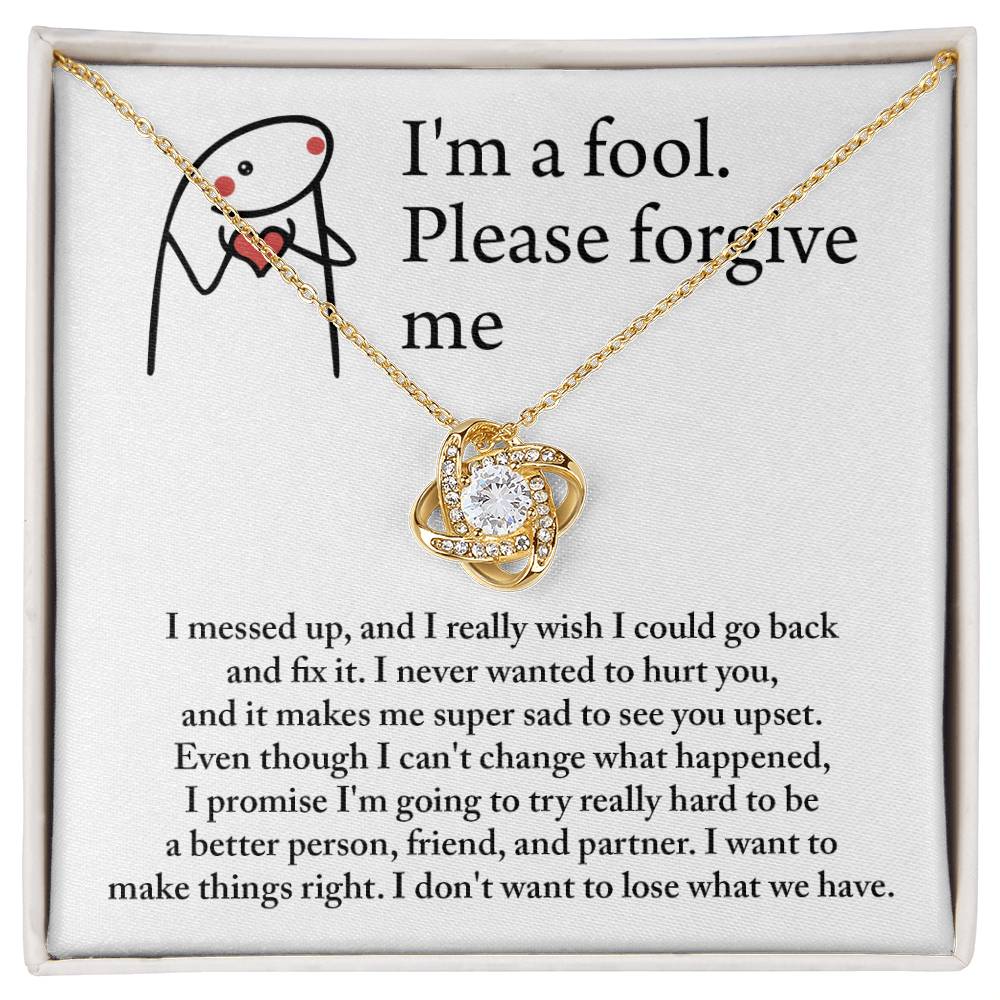 The "Sorry, Make Things Right - Love Knot Necklace," adorned with cubic zirconia crystals and elegantly displayed in a gift box, features a 14k white gold pendant that comes with a heartfelt apology message, asking for forgiveness and expressing deep regret for causing hurt.