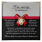 A personalized gift, the Sorry-Made You Sad - Love Knot Necklace featuring a heart-shaped pendant adorned with cubic zirconia crystals, is displayed alongside a heartfelt apology message expressing sorrow and a plea for forgiveness.