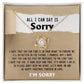 A gold Sorry-Keep Me Apart - Love Knot Necklace featuring a heart-shaped pendant, elegantly presented in a box adorned with cubic zirconia crystals. The package includes a heartfelt apology message titled "All I Can Say Is Sorry," expressing deep regret and a plea for forgiveness.