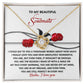 The Soulmate-Every Morning - Love Knot Necklace, featuring cubic zirconia crystals, is beautifully displayed above a card with red roses and a touching message to "Soulmate," symbolizing your unbreakable bond.