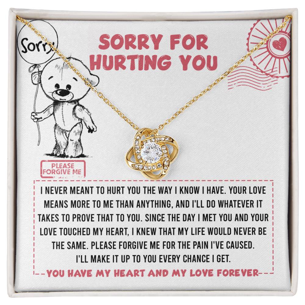 A Sorry-Every Chance - Love Knot Necklace gift box adorned with cubic zirconia crystals and a heartfelt apology message featuring a bear illustration, text "SORRY FOR HURTING YOU," and a promise to make amends.