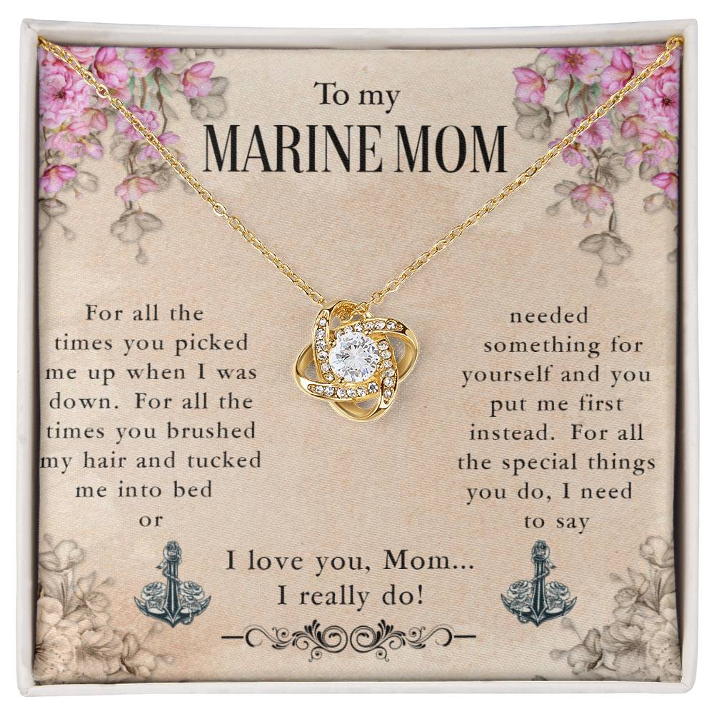 A To My Marine Mom, For All The Times You Picked Me Up - Love Knot Necklace featuring a heart-shaped charm adorned with cubic zirconia crystals and an inscription that celebrates and expresses love and appreciation for a marine mom by ShineOn Fulfillment.