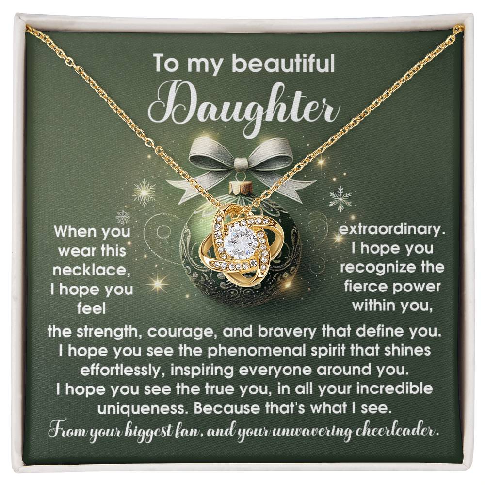 The Daughter-Incredible Uniqueness - Love Knot Necklace comes on a card that states: "To my beautiful daughter," accompanied by an inspirational message about strength, courage, and uniqueness. This personalized gift is enhanced with premium cubic zirconia for added elegance and sparkle.