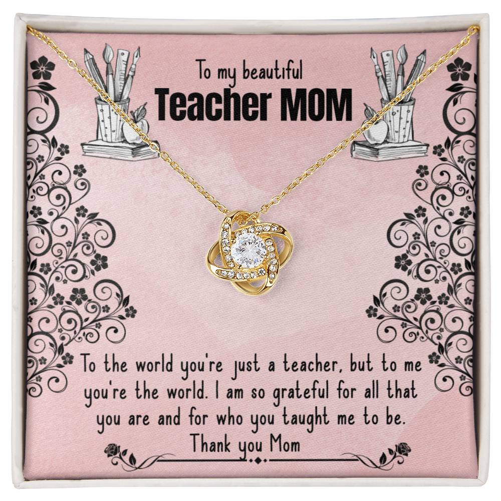 A necklace gift box with a sentimental message for a mother who is also a teacher, featuring an 18k yellow gold To My Beautiful Teacher MOM, To The World You're Just A Teacher - Love Knot Necklace with a heart design by ShineOn Fulfillment.