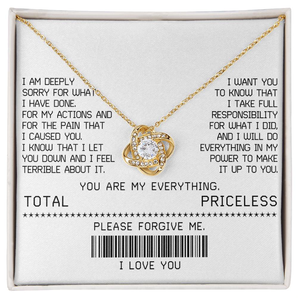 The Sorry-Make It Up - Love Knot Necklace, featuring a white gold finish and adorned with shimmering cubic zirconia crystals, is beautifully presented on a card with an apology message. This card includes phrases such as "TOTAL PRICELESS," "PLEASE FORGIVE ME," and "I LOVE YOU," along with a barcode, making it the perfect elegant touch for your sincere apology.