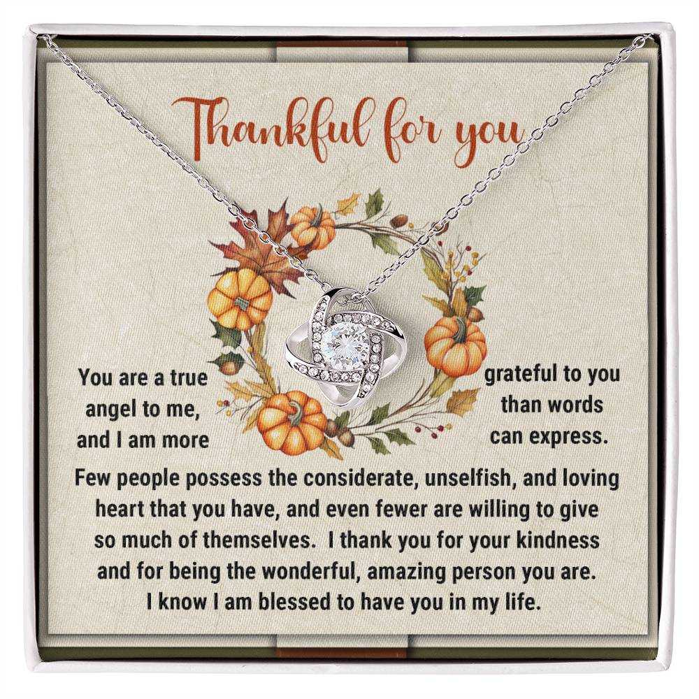 The Thanksgiving-The Wonderful - Love Knot Necklace set, embellished with cubic zirconia crystals, is beautifully presented on a card featuring an autumn-themed design with pumpkins and leaves, accompanied by a heartfelt thank you message.